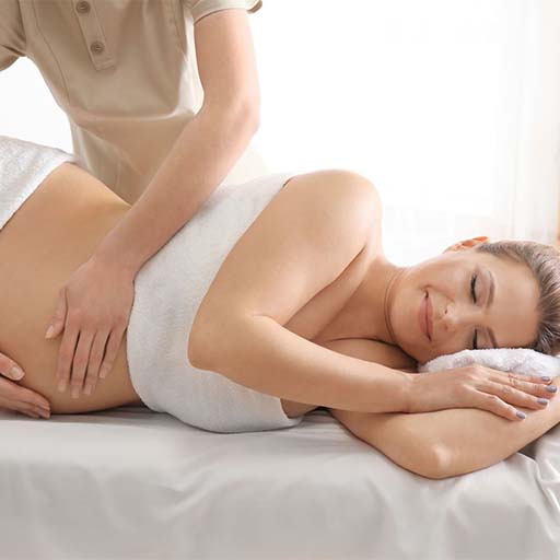 pregnant woman massage in coral springs Florida, relieves leg cramping, increases circulation in pregnancy